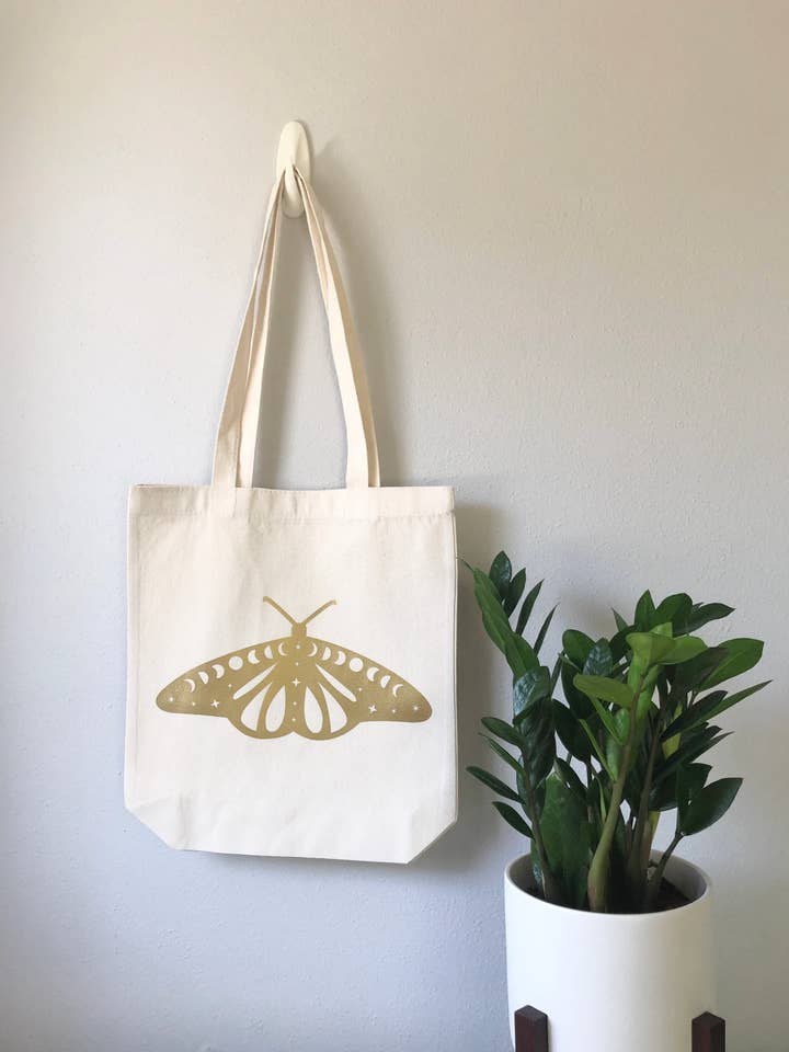 Cosmic Moth Witchy Tote Bag for wholesale by Wishcraft Goods