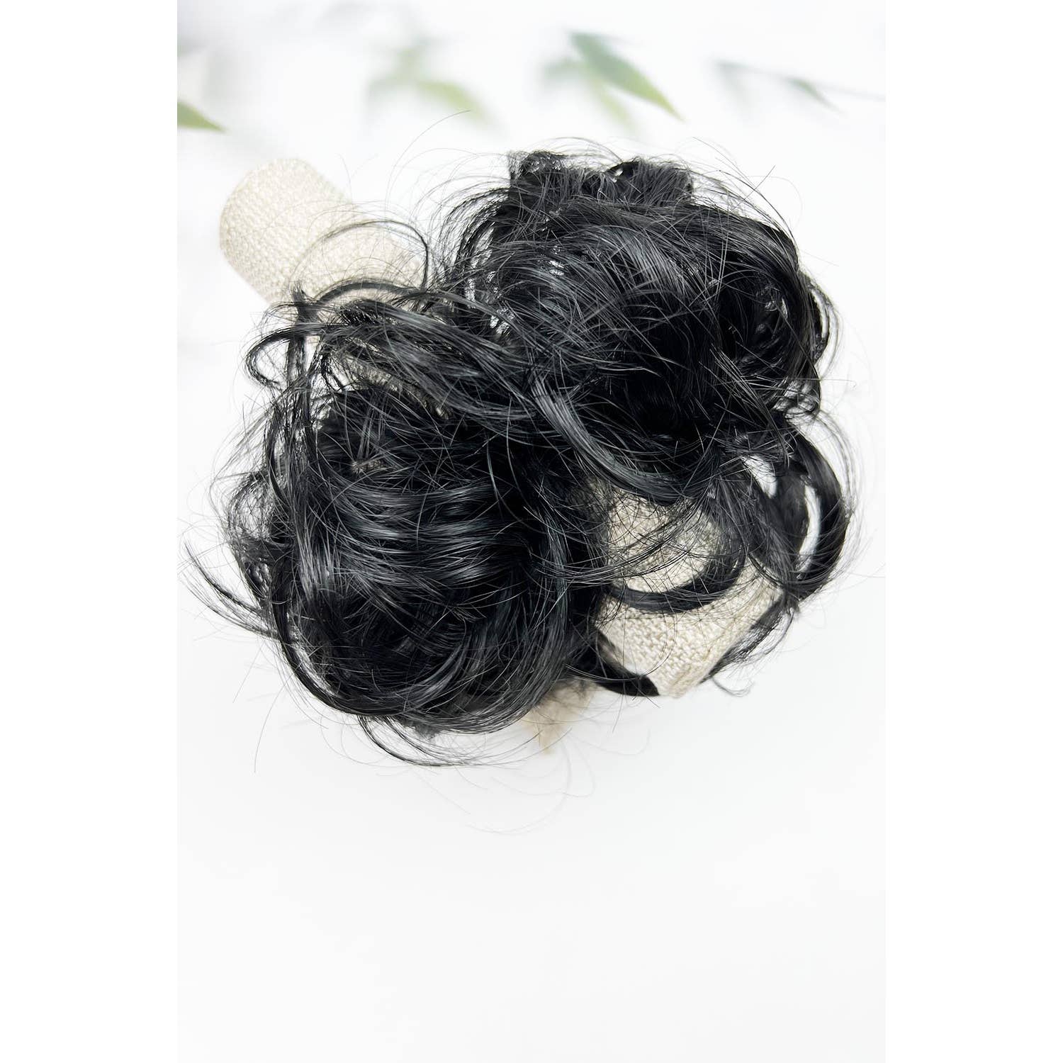 BLACK HAIR EXTENSION BUN ELASTIC PONY TAIL for wholesale on Faire