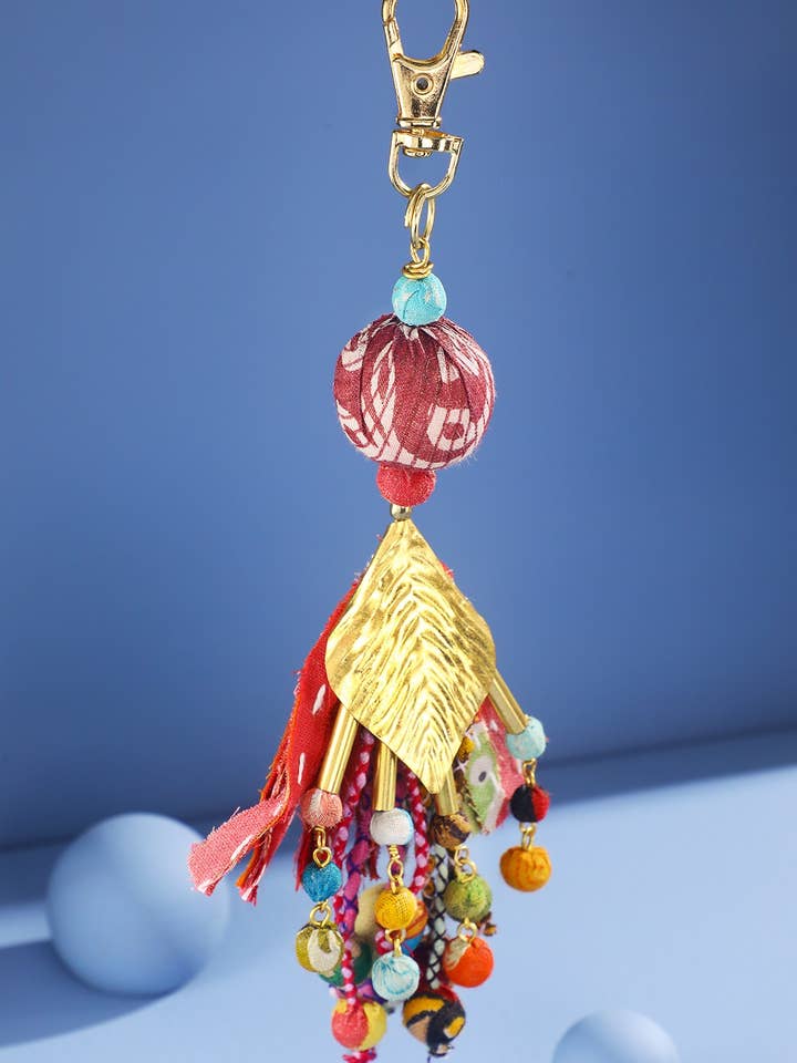 Handmade Cotton Tassel Brass Leaf Keychain for wholesale by Marionette