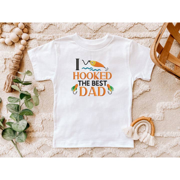 I Hooked The Best Dad Embroidered T-Shirt for wholesale by Cordelia Rae