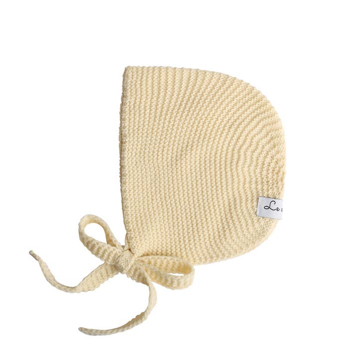 Knit bonnet cream for wholesale by Le enfant