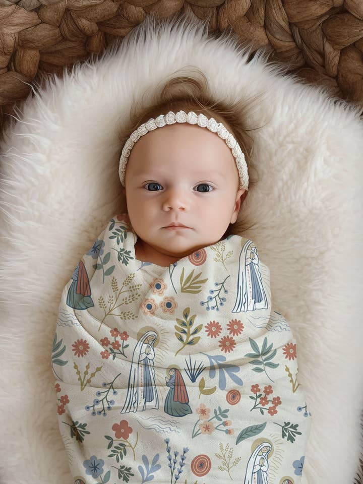 The Stump of Jesse - Wholesale Swaddle - Baby - Our Lady of Lourdes & St. Bernadette Deluxe Swaddle Catholic