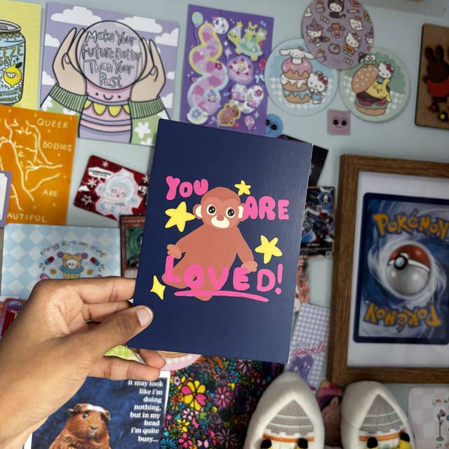 monkey positivity postcard print for wholesale by squiglysketches