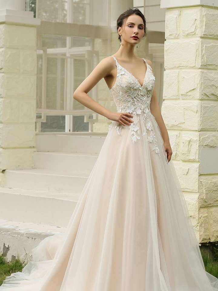 Leonie for wholesale by Enchanted Bridal