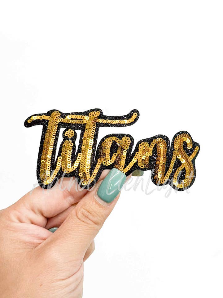 Titans Cursive Sequins Iron On Patch-Gold for wholesale by ABLNco