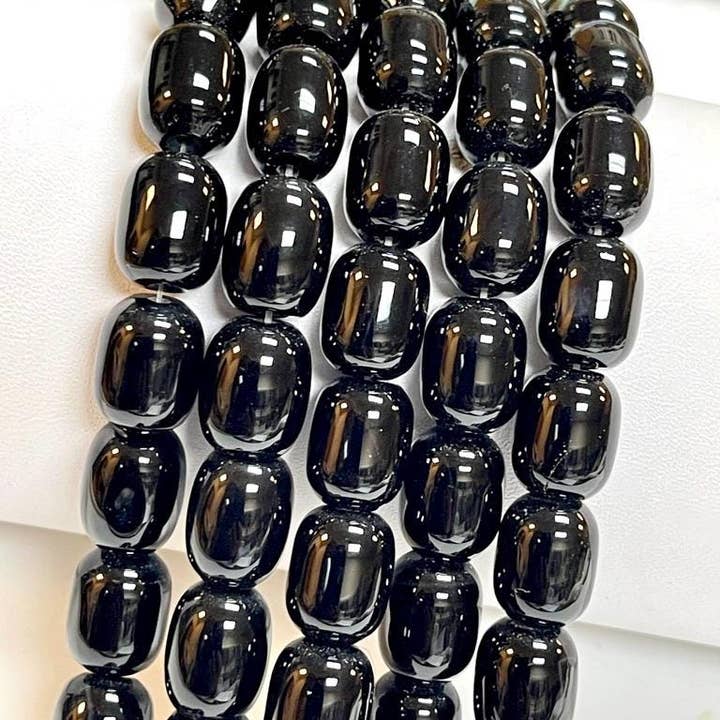 14x10mm Black Onyx Smooth Rice Barrel Drum Beads Strand for wholesale by TRIVENI USA INC