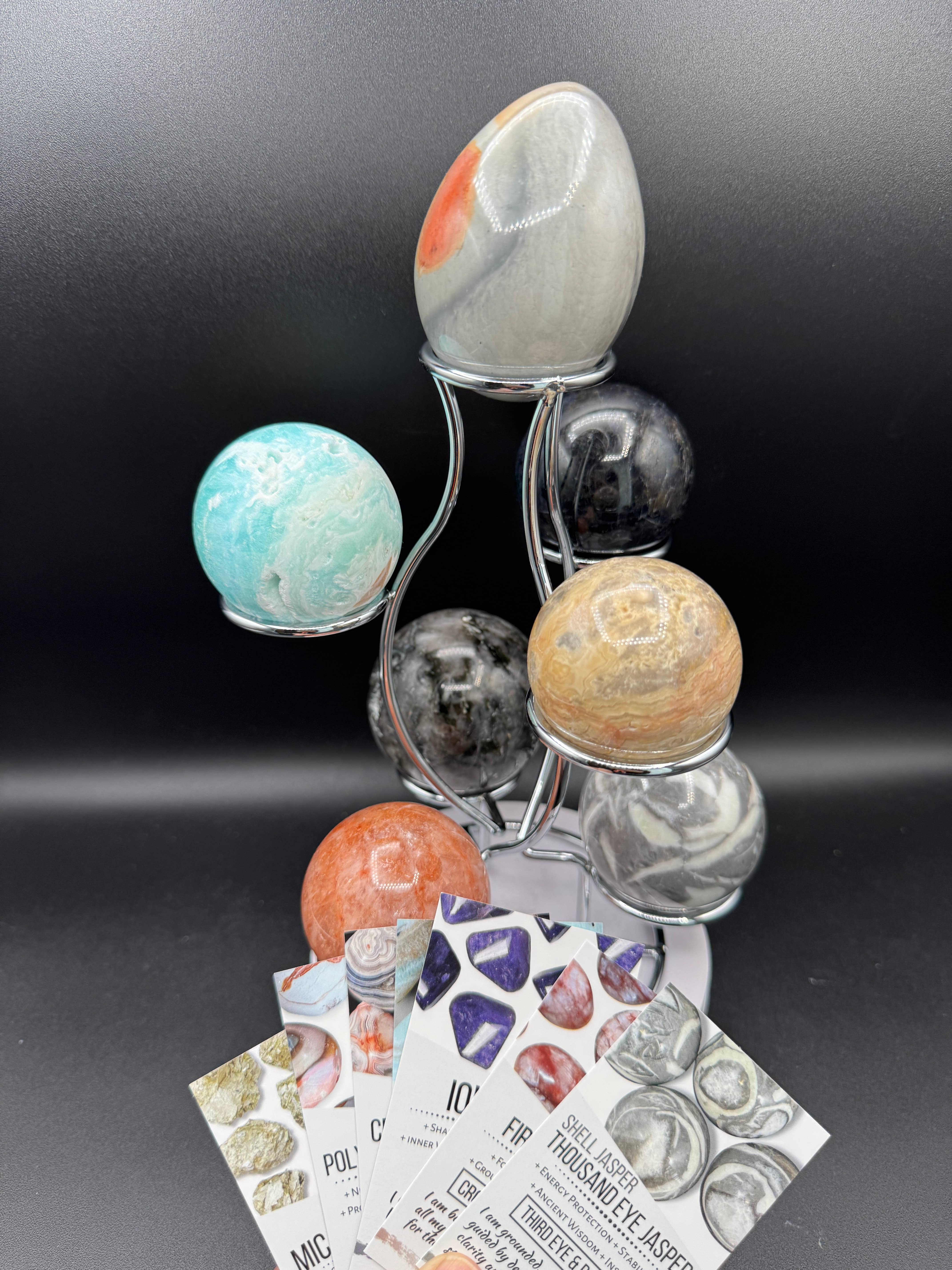 The 7 Directions - Wholesale Spiritual Stone/Crystal - 7 pc Mica Iolite fire quartz sphere w/ display stand G9962