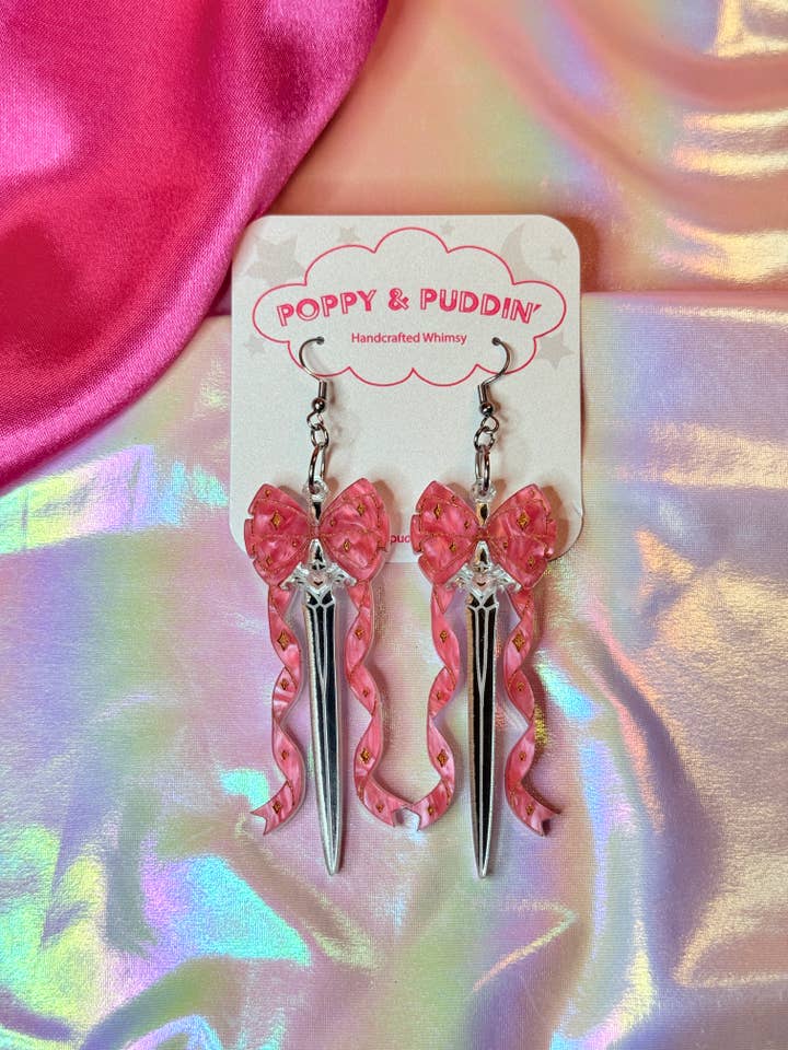 Pretty Sword Earrings | Pink Bow Sword | Fantasy Earrings for wholesale by Poppy and Puddin’ Crafts