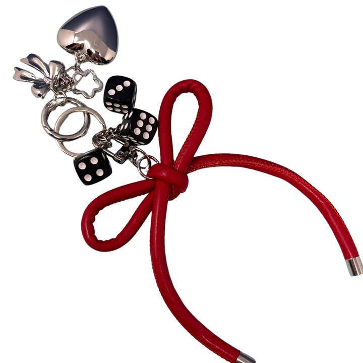 Red Bow Keychain with Black Dice and Silver Heart Charms – Y2K Statement Bag Charm for wholesale by Rainbow Unicorn Birthday Surprise