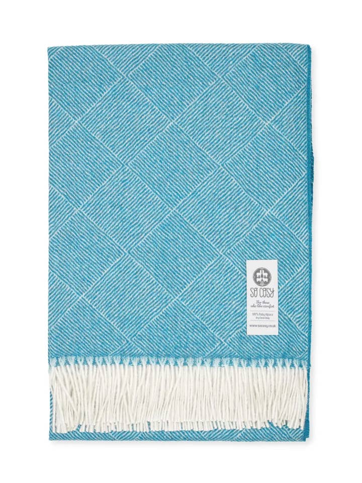 Derry Baby Alpaca Plaid i Krystal Teal for engroshandel hos So Cosy Ltd.
