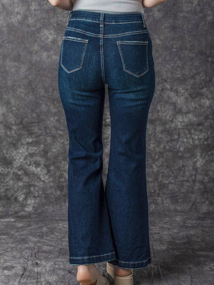 Real Teal Khloe High Rise Ripped Bell Bottom Jeans for wholesale on Faire1