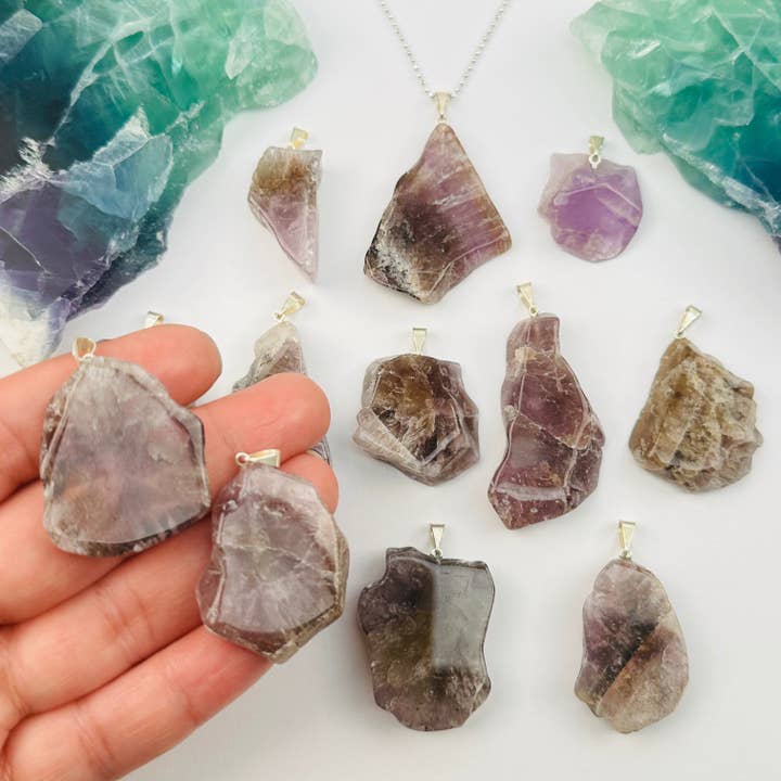 Super Seven Crystal Polished Slice Pendant for wholesale by Rock Paradise