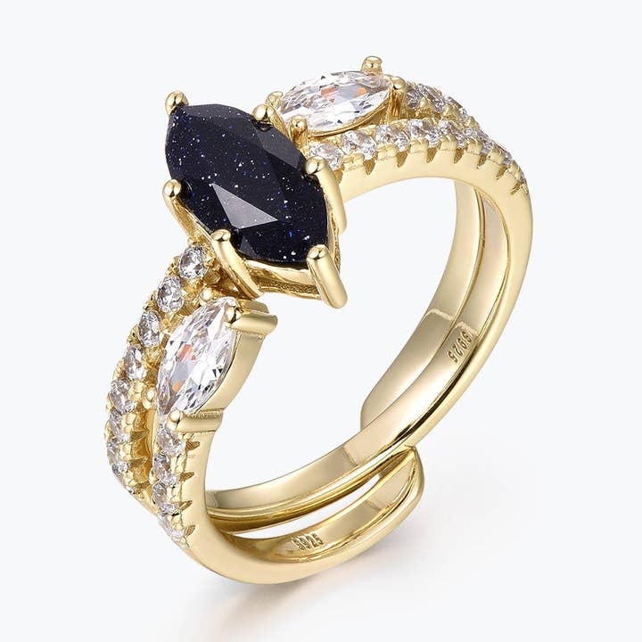 Bague de fiançailles demi-pavée Dissoo® en pierre dorée bleue marquise avec alliance à tige ouverte pour la vente par Dissoo