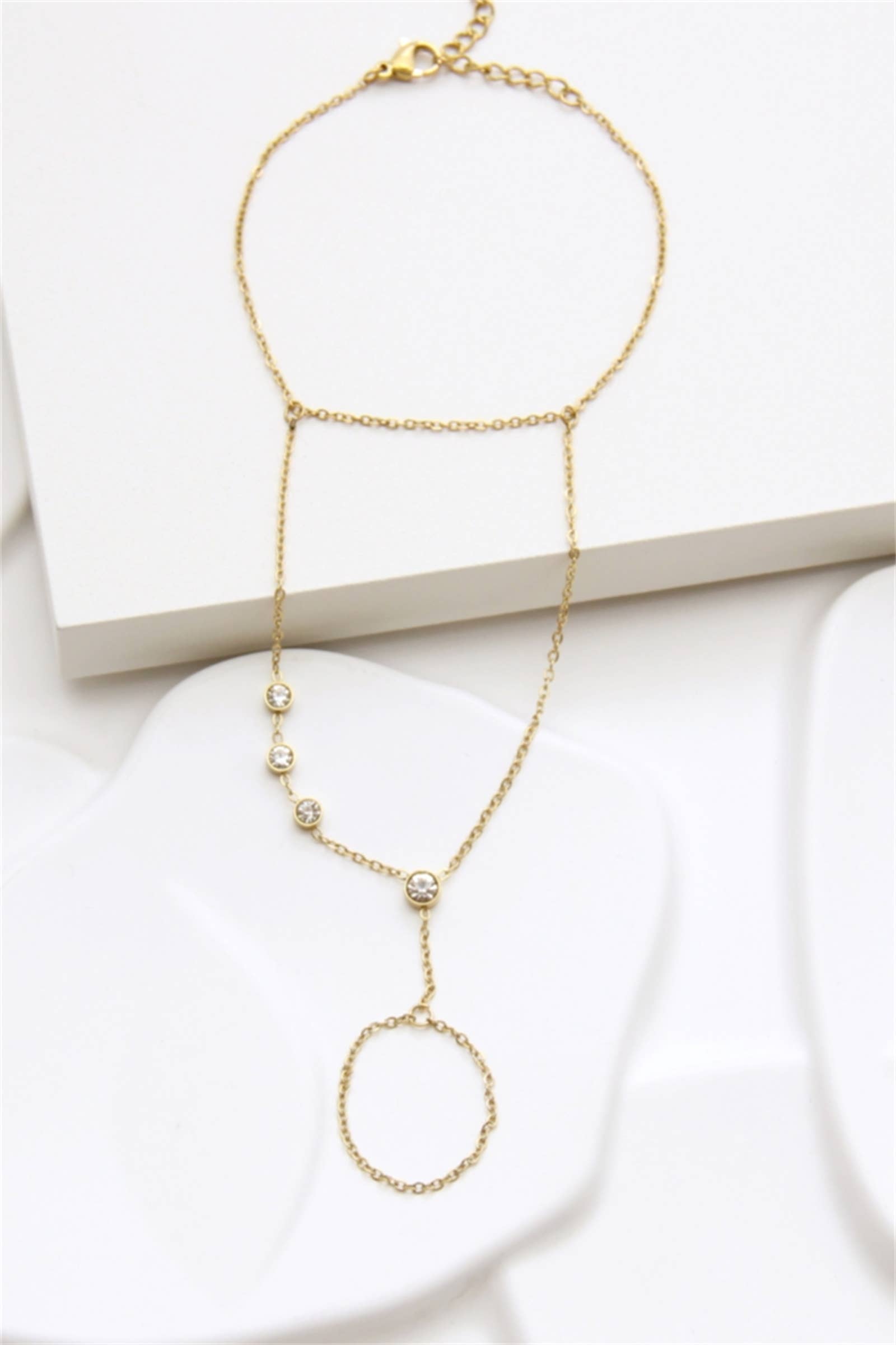 golden Gold stainless steel hand bracelet for wholesale on Faire1