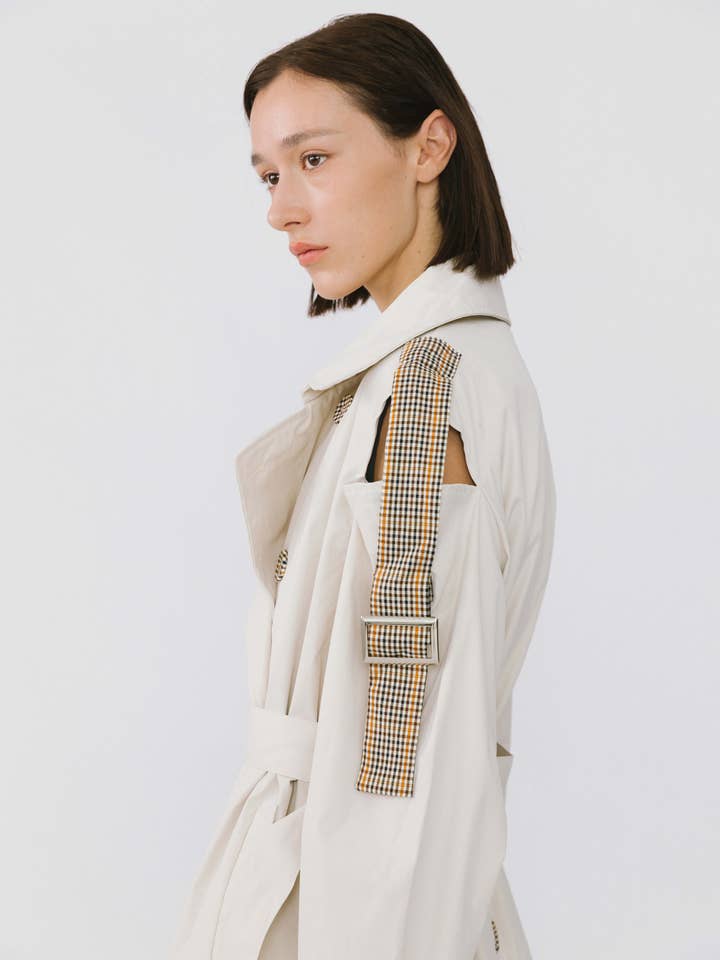 Beige Trench con spalle scoperte in vendita all'ingrosso su Faire