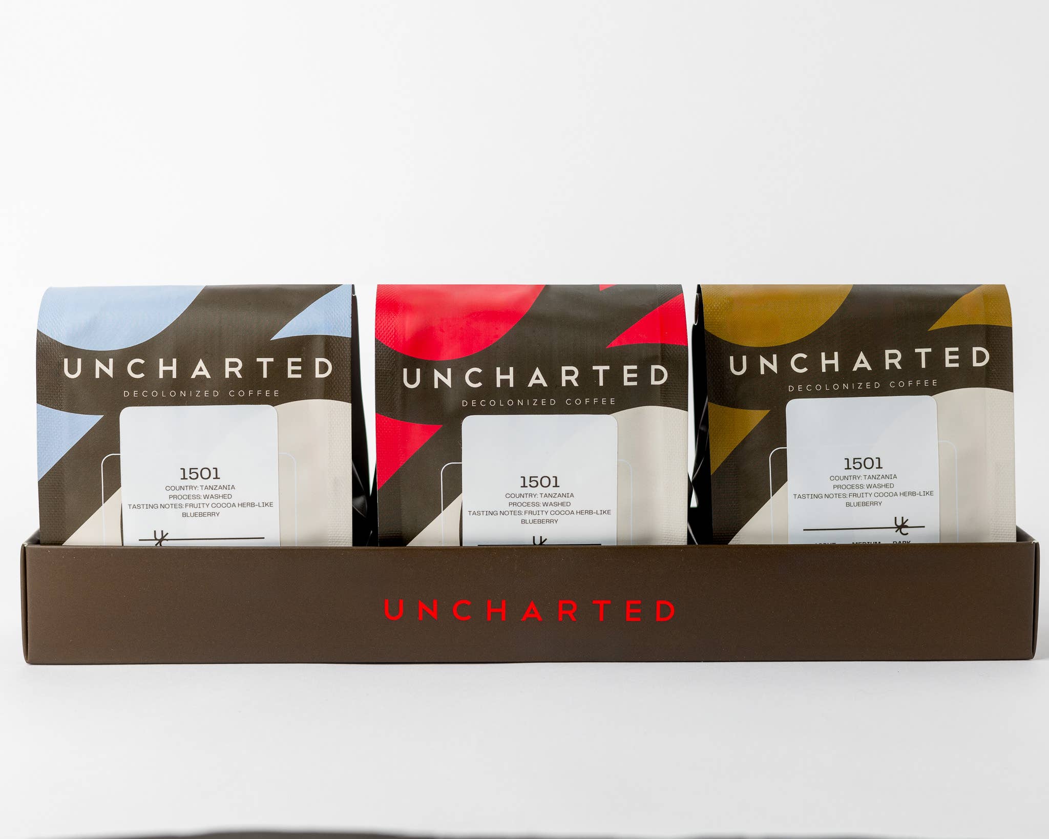 Uncharted Coffee - Wholesale Koffiebonen - Biologische Hele Bonen Koffie Cadeauset (10 st/doos)1