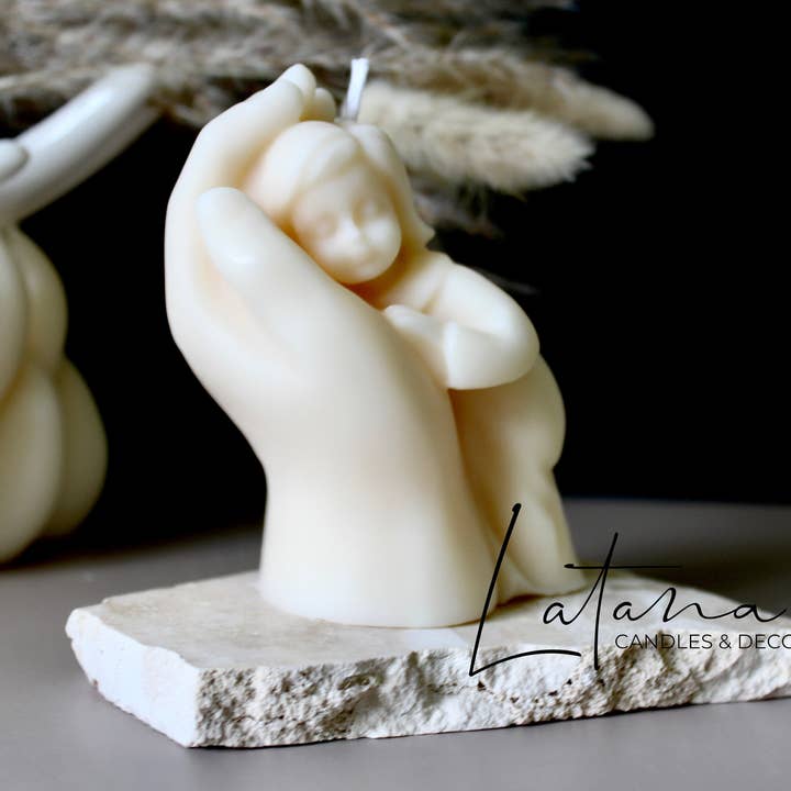 Baby In Hand Candle for wholesale by Latana Candles