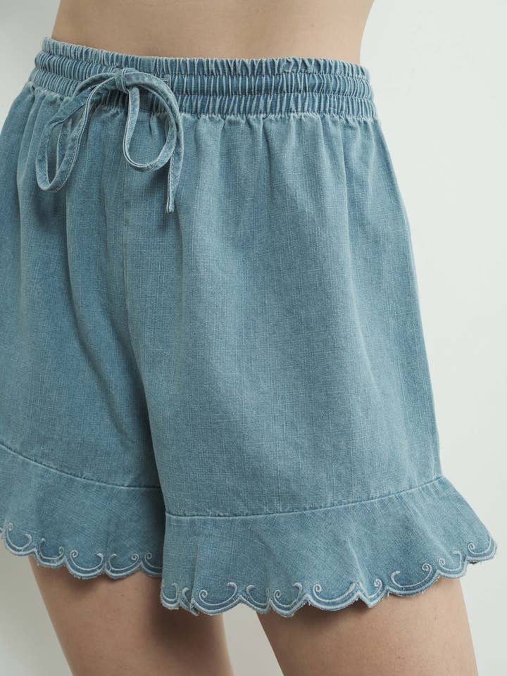 DENIM MAP3110 CHAMBRAY EMBROIDERED RUFFLE HEM SHORTS for wholesale on Faire