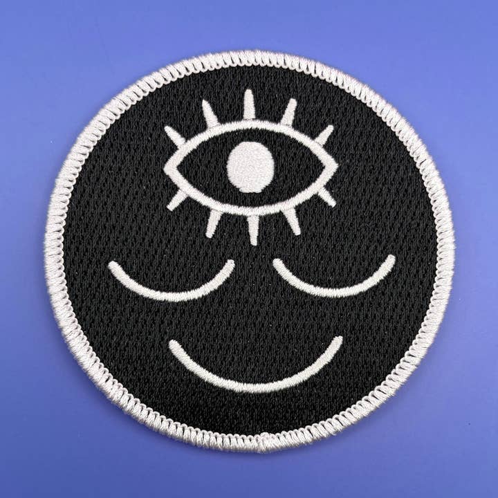 Patch - Black & White Smiley Face with Third Eye for wholesale by Wokeface