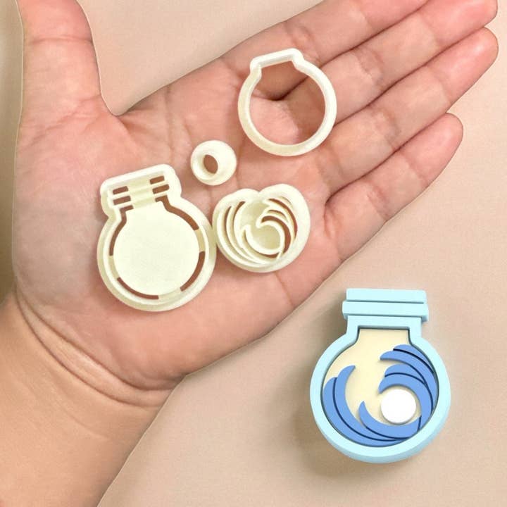 Sea Bottle Waves wash the pearls Polymer clay cutter for wholesale by Roussell Prints and Demand LLC