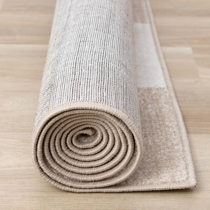 Century Cream Beige Checkerboard Pet-Friendly Area Rug for wholesale on Faire5