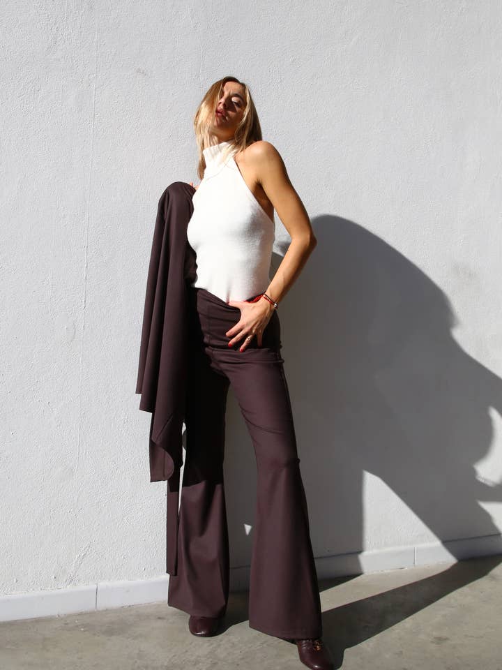 COLETE DE LÃ SEM MANGAS CREME por atacado de Moqette