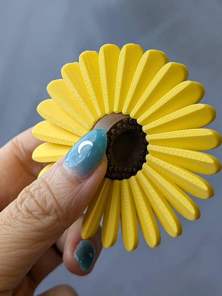 Sunflower Spinner for wholesale by Sapphic Space