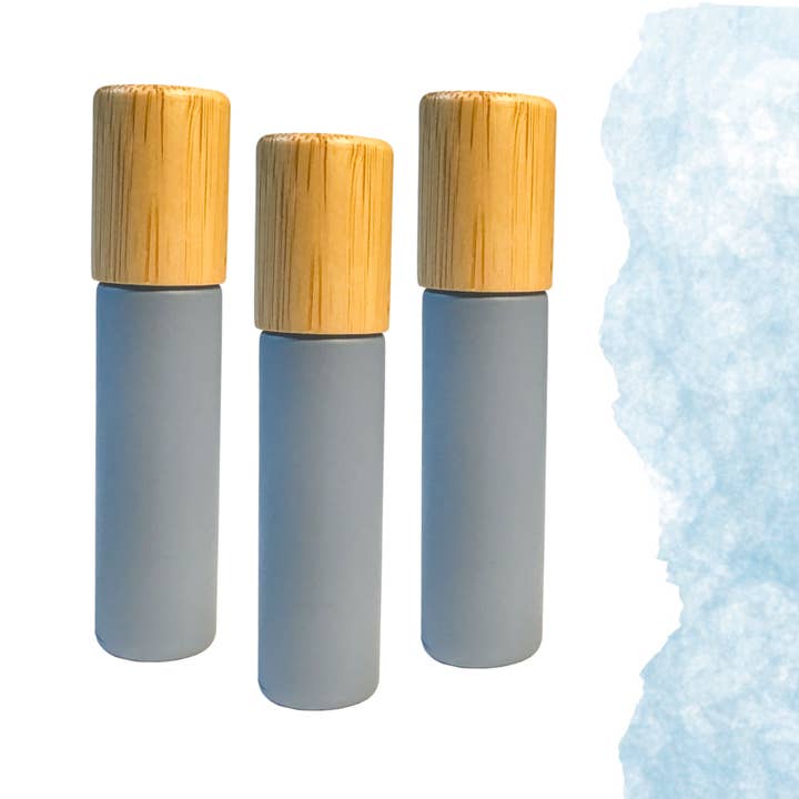 Bouteille à rouleau BLEU CIEL 10/5ml en verre avec bouchon en bambou pour la vente par Essential Wellness - Body, Mind, Spirit