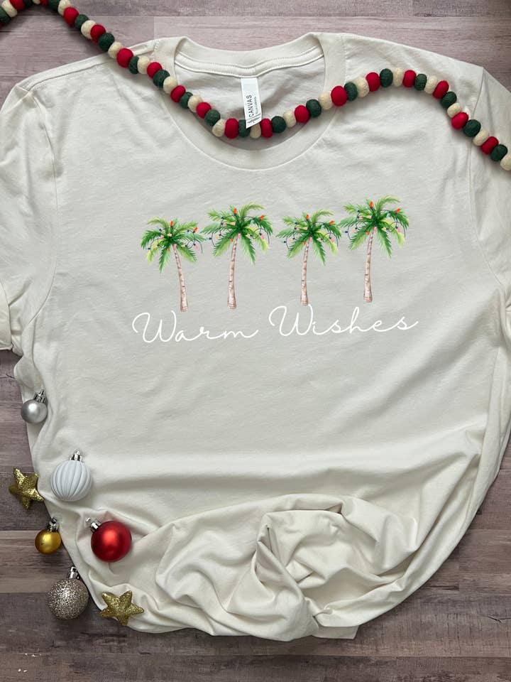 Warm wishes, palm tree tropical Christmas t-shirt for wholesale by Sunshine Collective