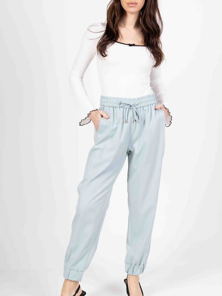 Byxor med dragsko för wholesale av magnolia