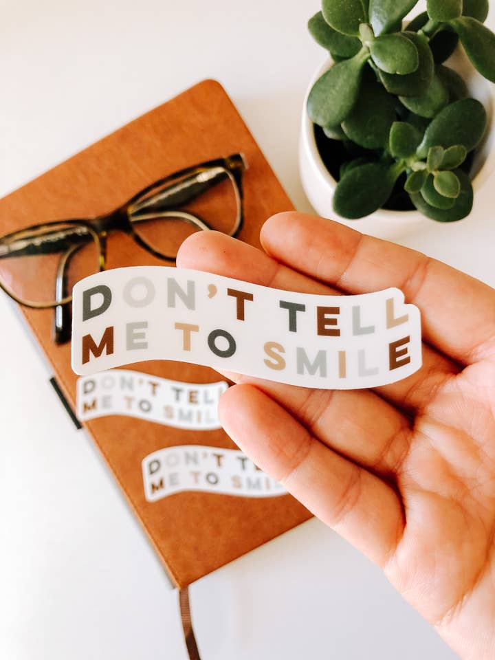 Don't Tell Me to Smile Sticker for wholesale by Dawning Designs