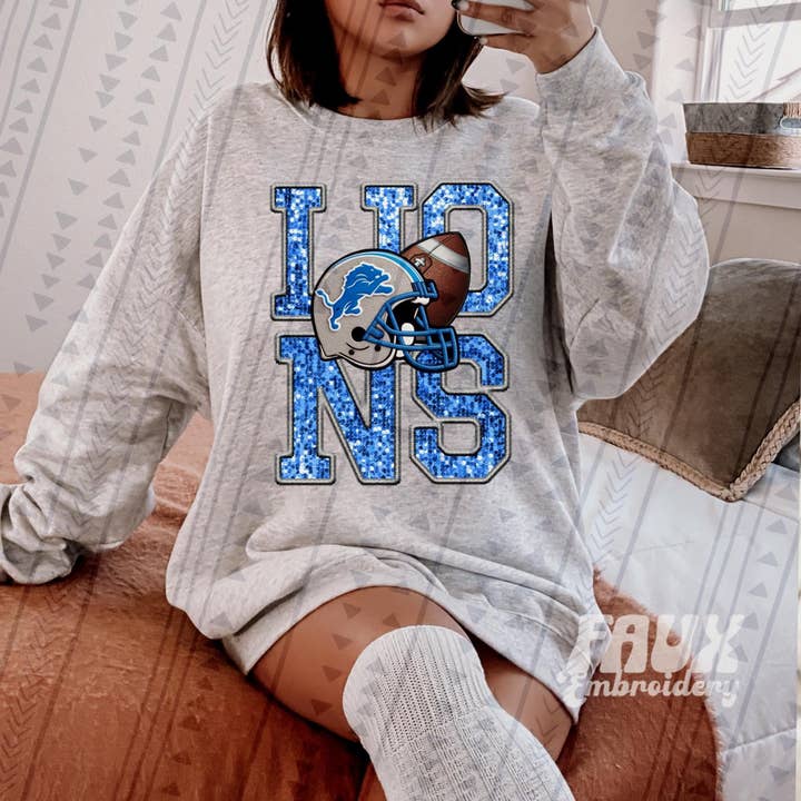 Tucker with a Tee – wholesale Graphic sweatshirt – Women’s – Lions Sweatshirt