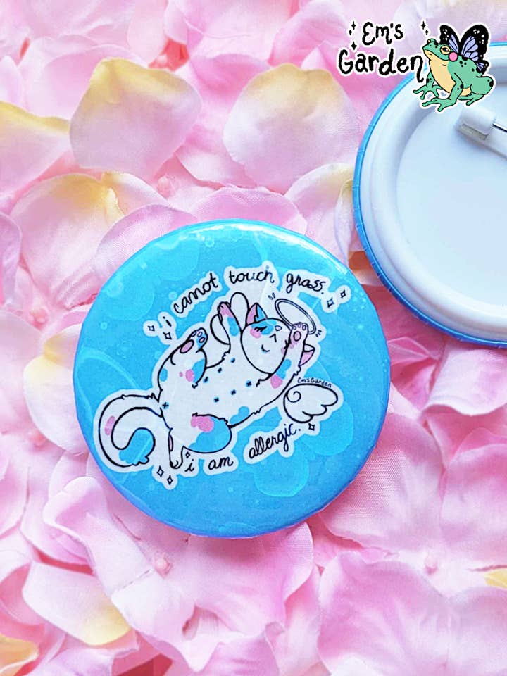 Can't Touch Grass / Trans Angel Kitty Glimmer Button Badge for wholesale by Em's Garden