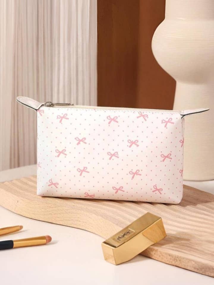 ....SI-27949 Trousse de maquillage en cuir végétalien avec nœud papillon pour la vente par 42POPS
