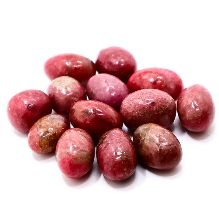 Crystal Rhodonite Tumbles for wholesale by Portals and Palms LLC