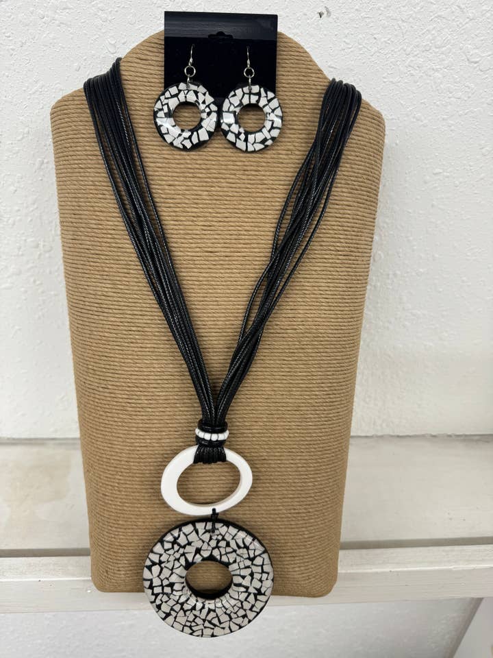 20 STRANDS BLACK WAX CORD WITH ROUND BLACK AND WHITE DONUT R for wholesale by International Duru's