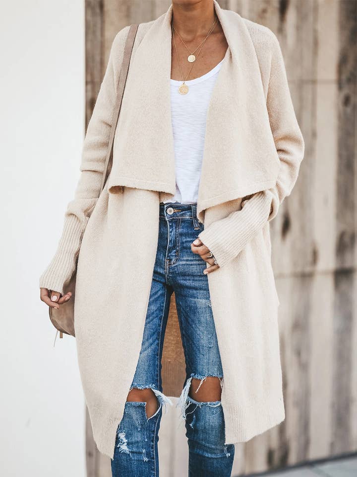 Large lapel unbuttoned solid color long cardigan coat and other Purchase Wholesale wool jacket. Free Returns & Net 60 Terms on Faire trending on Faire.