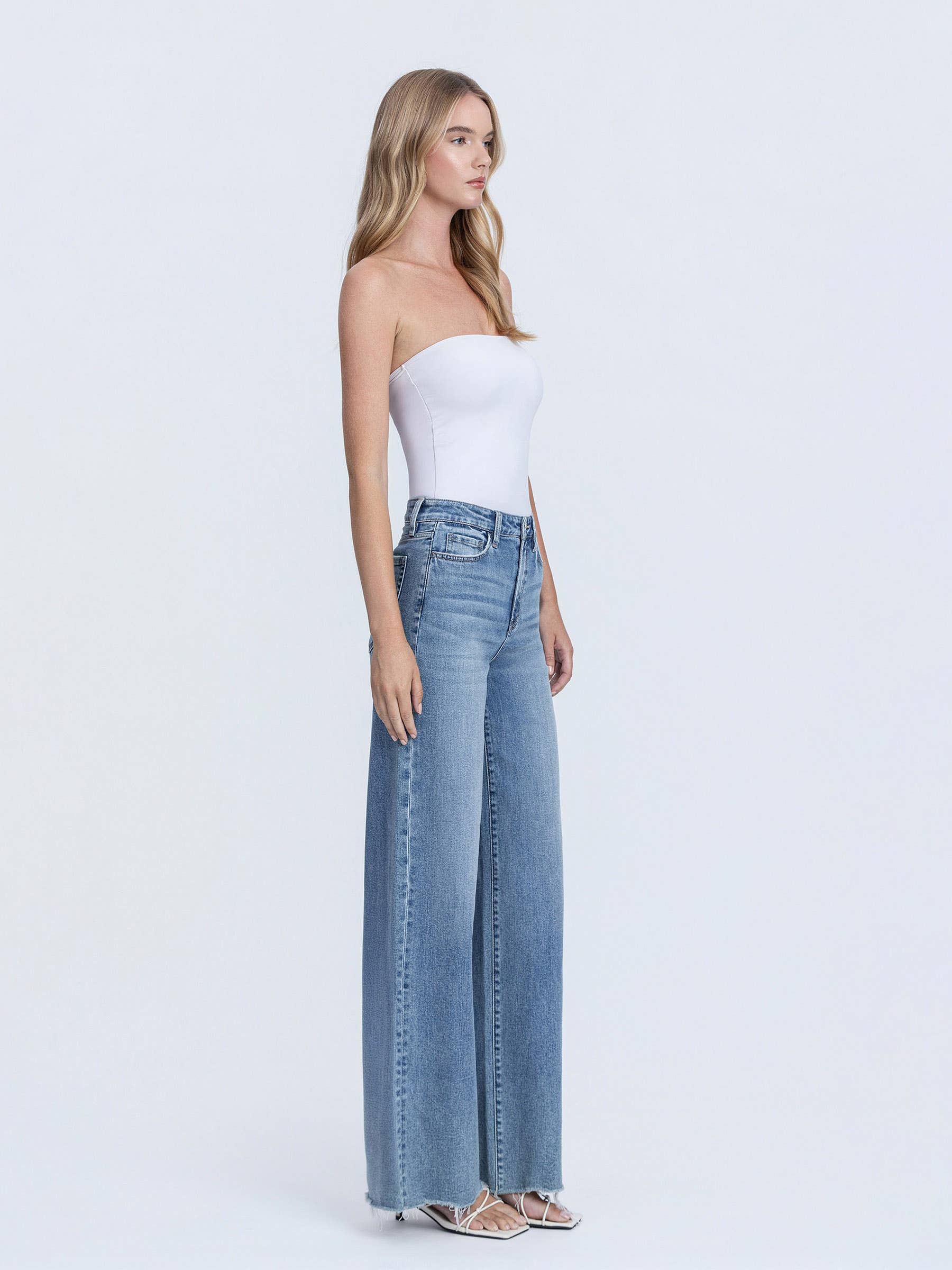 CLOSENESS SUPER HIGH RISE MEDIUM WASH RAW HEM WIDE LEG JEANS F6373 for wholesale on Faire4