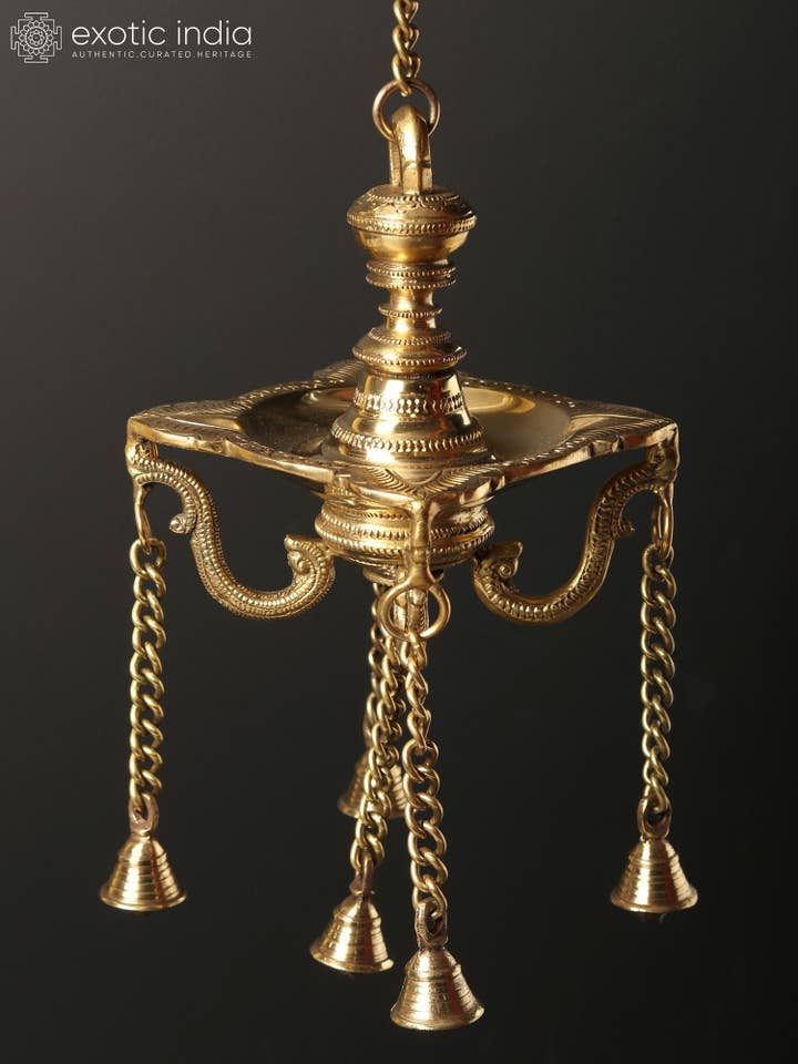 6" Four Wicks Designer Lamp with Dangling Bells for wholesale by Exotic India Art