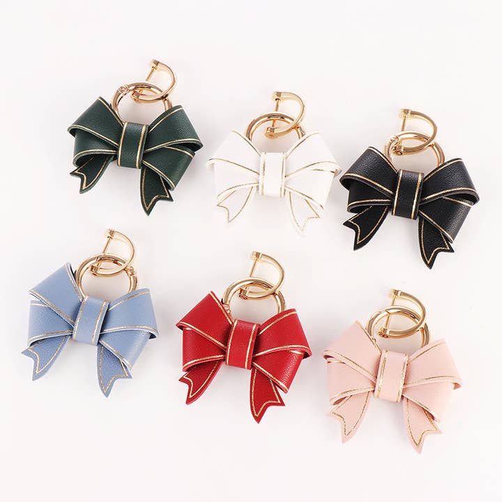 PU Leather Cute Bow Key Charm and other Purchase Wholesale bow keychain. Free Returns & Net 60 Terms on Faire trending on Faire.
