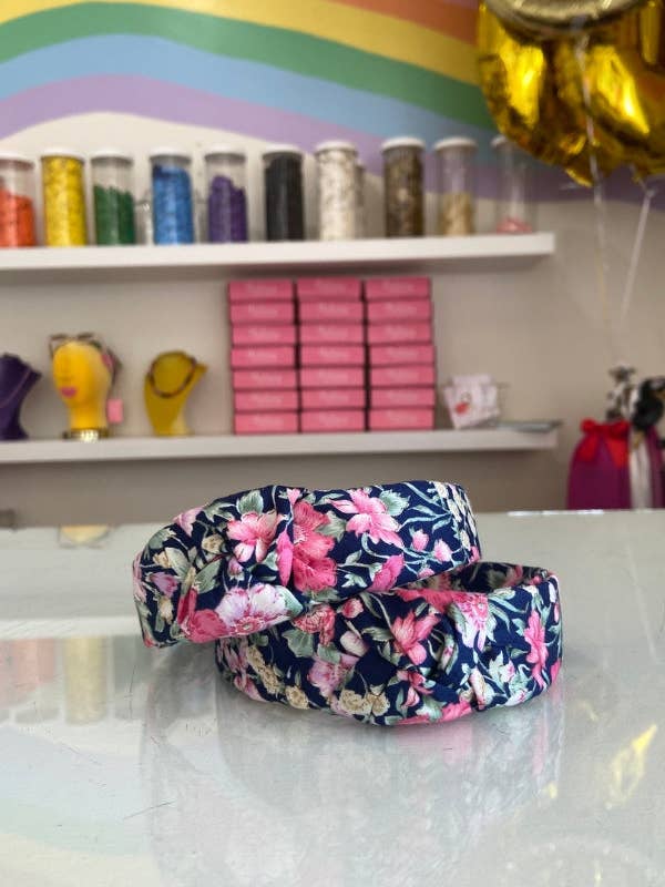 The Tiny Tassel Headband in Navy Floral for wholesale by The Tiny Tassel