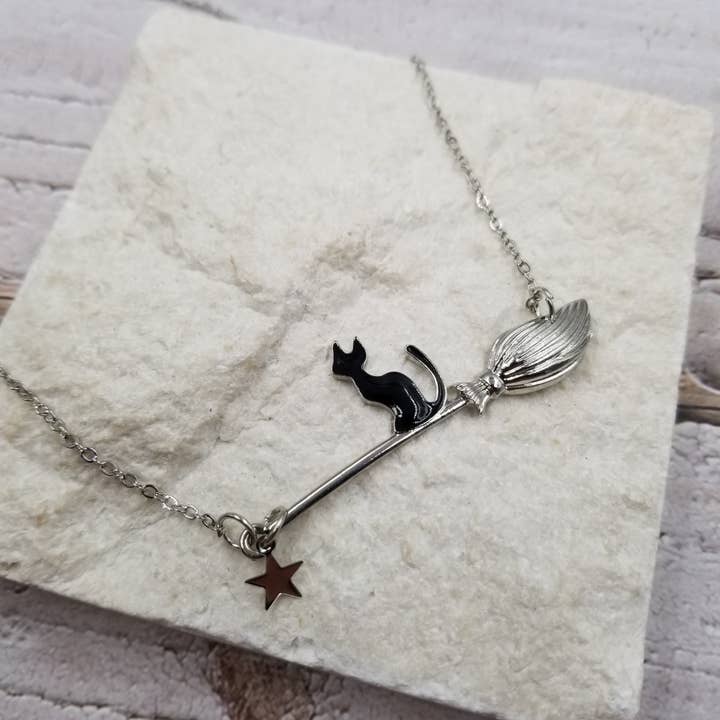 Magic Broom Black Cat Necklace and other Purchase Wholesale witch charms. Free Returns & Net 60 Terms on Faire trending on Faire.