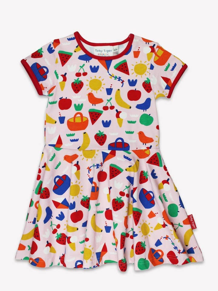Vestito da pattinatrice per bambini in cotone biologico a maniche corte con stampa picnic per la vendita all'ingrosso da parte di Toby Tiger GmbH