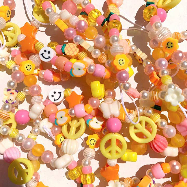 Breloque de téléphone ou de sac perlée - Lever de soleil pour la vente par Sunny Inside