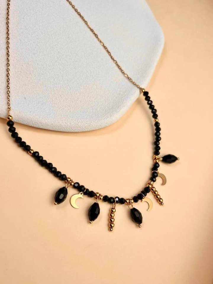 Double wrap necklace with black beads and golden moon in stainless steel for wholesale by COSMOS