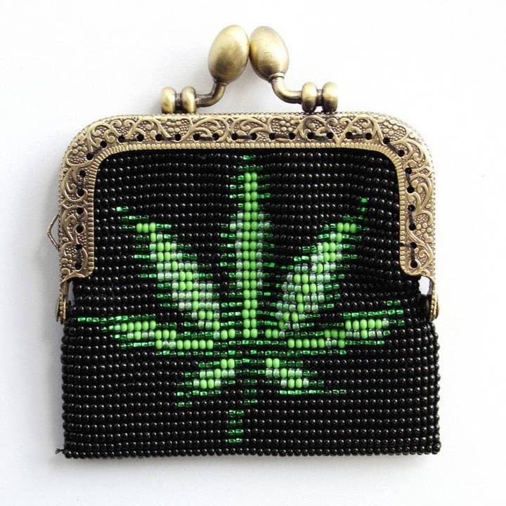 Porta-moedas de vidro com moldura metálica - Folha por atacado de La Casa Cotzal S.A.