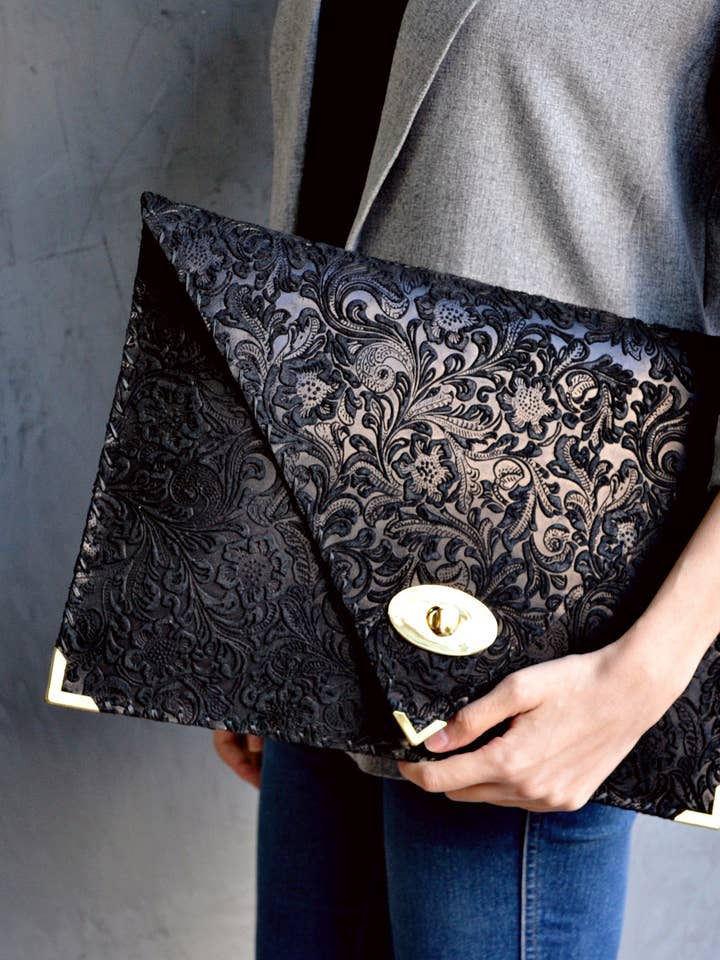 3D Black Symmetria Leather Clutch for wholesale by ANA KOUTSI