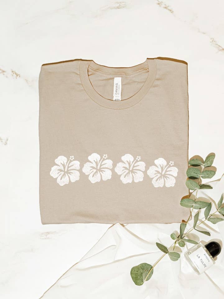 T-shirt graphique FLEURS HAWAÏENNES pour la vente par OAT COLLECTIVE