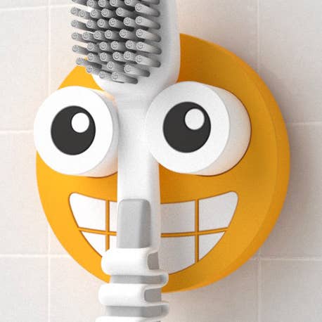 Soporte cepillo dental,Emoji,display x16 para venta al por mayor de Balvi