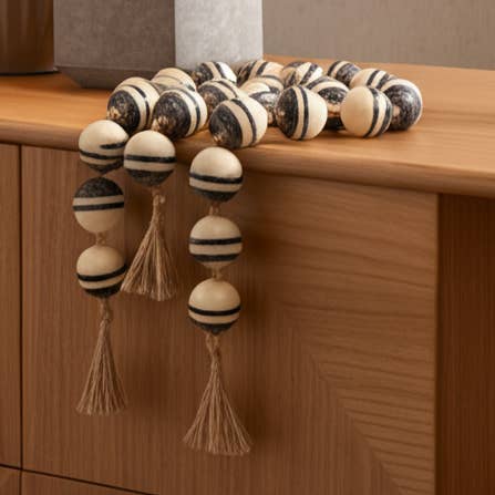 Polyresin Swirl Beaded Garland Jute Tassle - Ivory, 46 in. for wholesale by Sagebrook Home